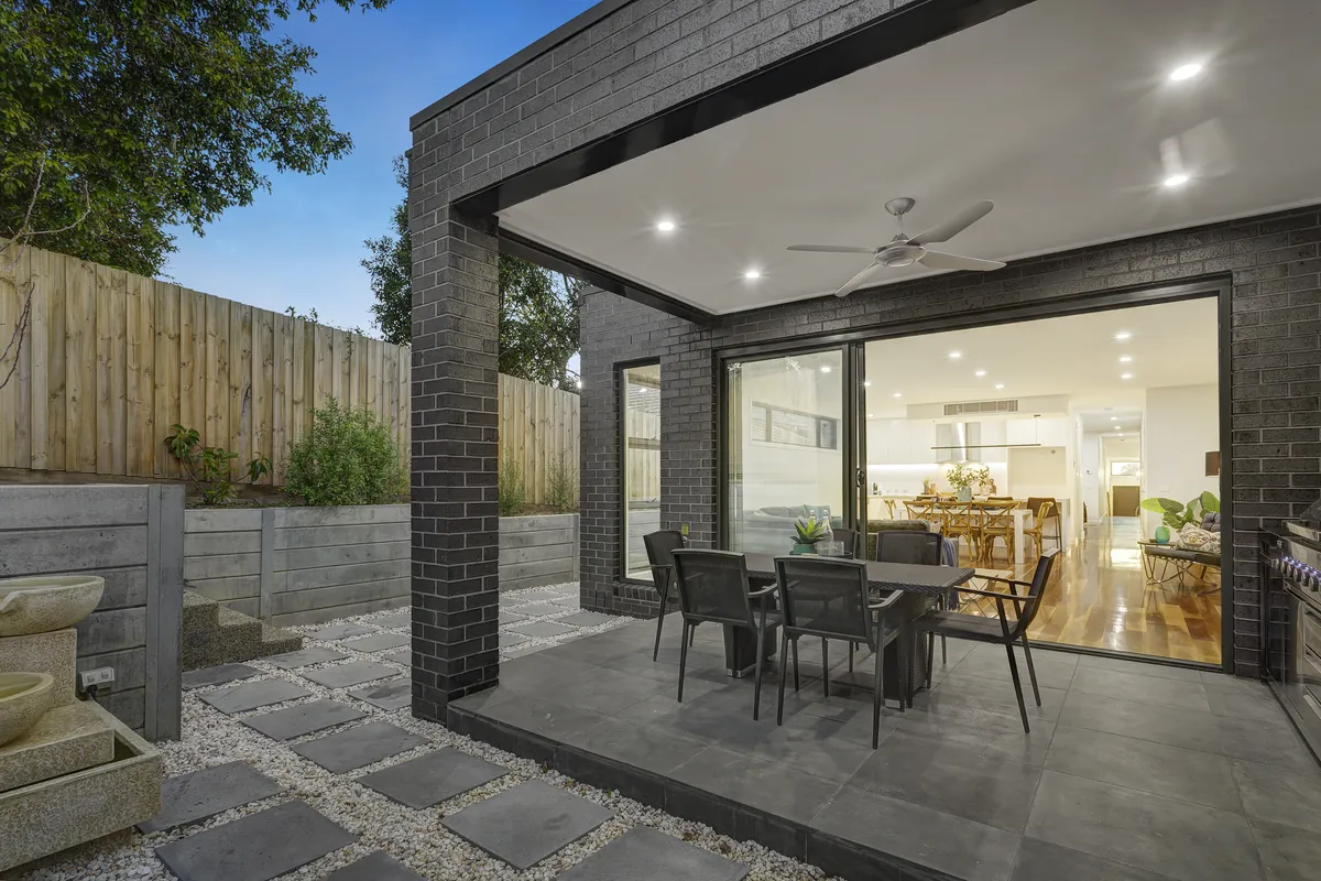 Alfresco area of a VD Homes residence at dusk
