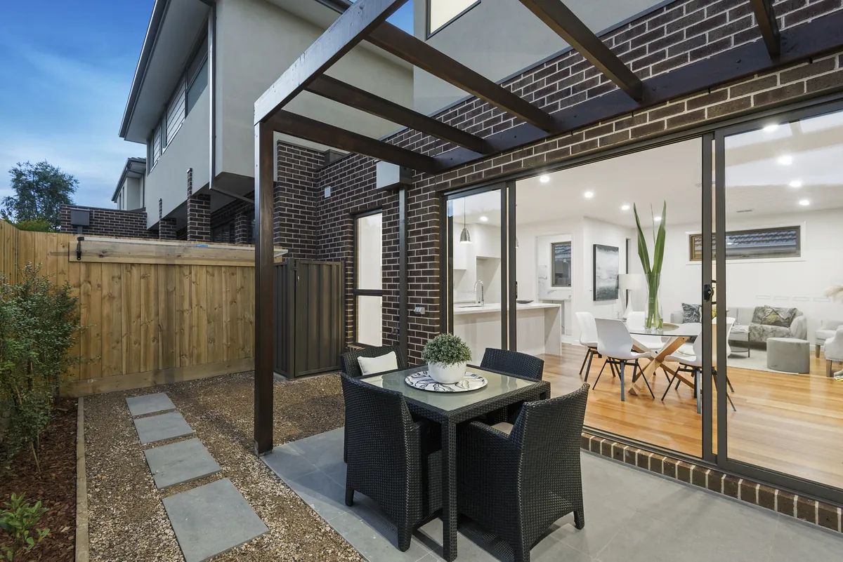 Covered outdoor dining area of a VD Homes residence